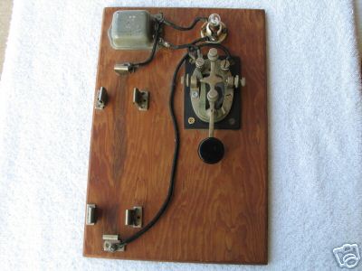 Vintage key paddle mounted on a board 