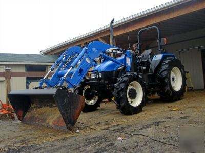 New 2005 holland TL90 4WD tractor w/front end bucket