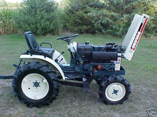 4X4 bolens compact tractor and loader with snow bucket
