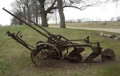Antique john deere steel wheel two bottom plow