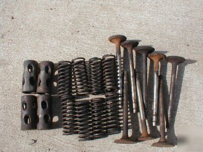 Farmall h valves and springs and ends for push rods.