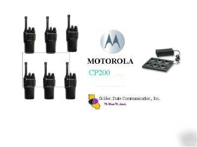 New 6 uhf motorola CP200 w/ rapid rate 6 bank charger