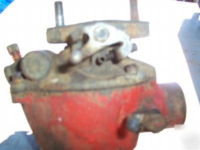 Old carb. off a running 9N tractor orig.??