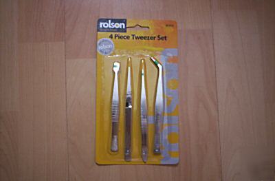 Set of four pairs of tweezers.