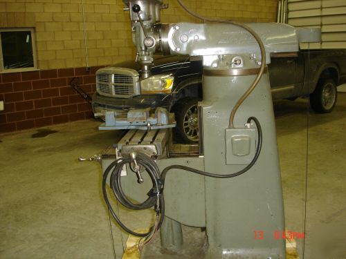 Bridgeport mill with tree mill head excellent condition
