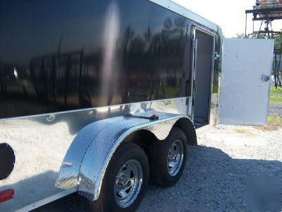 New 7X14 enclosed motorcycle trailer ramp loaded 