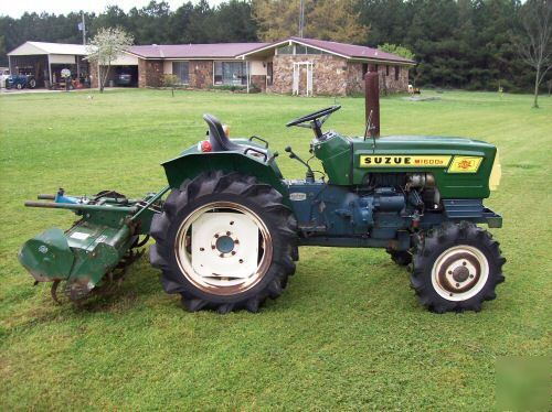 Nice suzue M1600 4X4 diesel compact tractor w/ tiller 