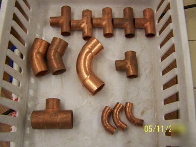 Assortment of copper pipe fittings