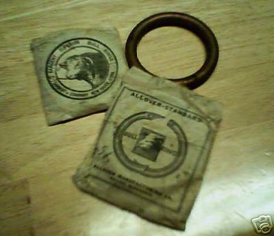 2 antique bull nose rings in original packages 