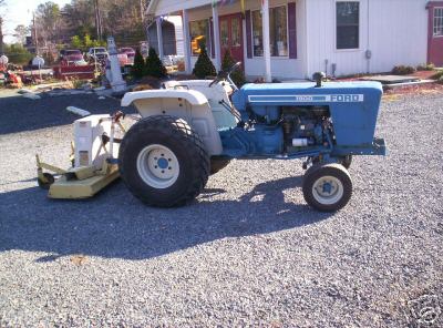 Ford 1900 tractor and woods mower (no )