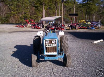 Ford 1900 tractor and woods mower (no )