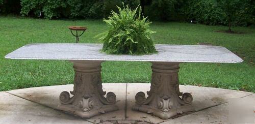 Granite top dining-conference table with ornate columns