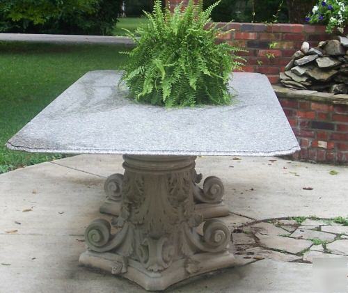 Granite top dining-conference table with ornate columns