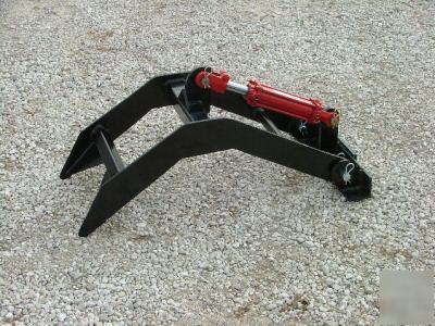 The little arm, grapple for skid loader or tractor 
