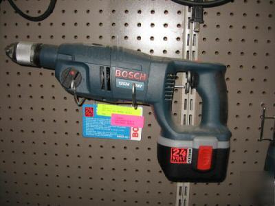New bosch heavy duty hammer drill on shelf, never used 