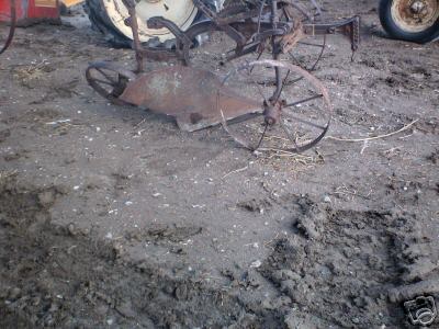 Horse drawn plow with steel wheels