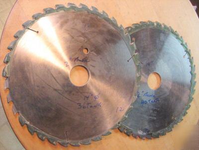 Two 14 inch carbide table saw blades 