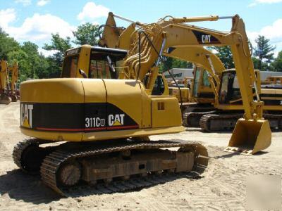 2002 cat 311CU excavator, good u/c, 26K lbs
