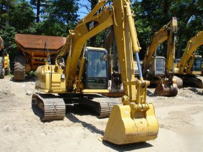 2002 cat 311CU excavator, good u/c, 26K lbs