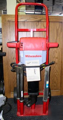 New milwaukee jack hammer with cart & 2 bits 