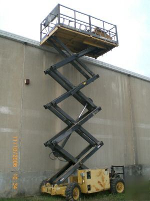 1996 grove SM3884XT all-terrain scissor lift