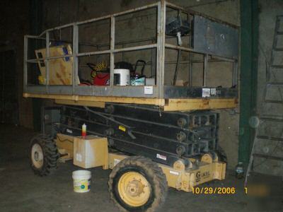 1996 grove SM3884XT all-terrain scissor lift