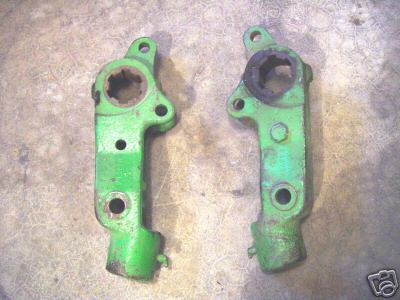 Cast rockshaft arms for 720/730 jd standard tractor