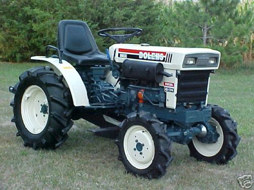 4X4 bolens compact tractor and loader with snow bucket