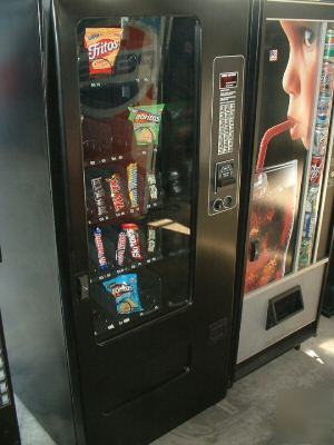  soda-snack vending machine combo- takes dollar bills