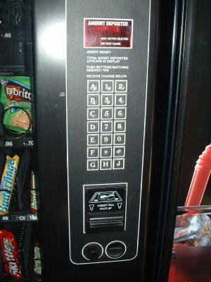  soda-snack vending machine combo- takes dollar bills