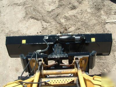 New 8 foot 6 way dozer blade plow for skid steer.