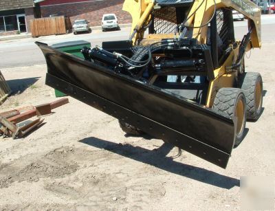 New 8 foot 6 way dozer blade plow for skid steer.