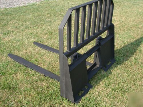 Pallet forks fit bobcat case & most skid steer loaders