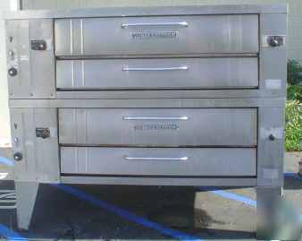 Real nice double stack bakers pride gas pizza ovens