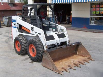 2001 bobcat 763 skid steer loader. financing available 