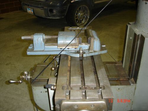 Bridgeport mill with tree mill head excellent condition