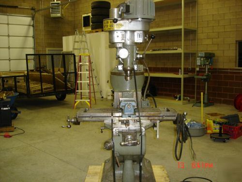 Bridgeport mill with tree mill head excellent condition