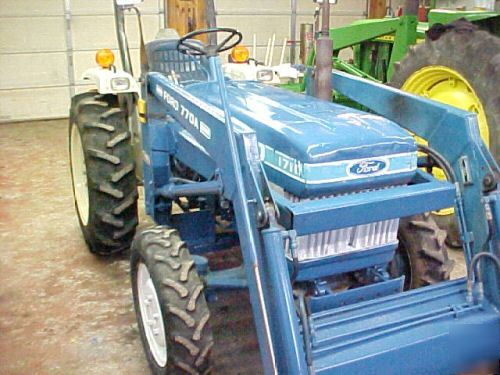 1985 ford 1710 4X4 tractor with 77A loader 