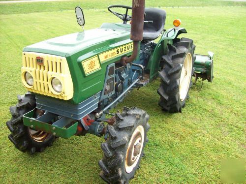 Nice suzue M1600 4X4 diesel compact tractor w/ tiller 