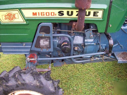 Nice suzue M1600 4X4 diesel compact tractor w/ tiller 