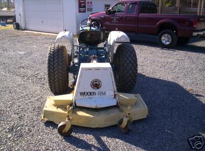 Ford 1900 tractor and woods mower (no )