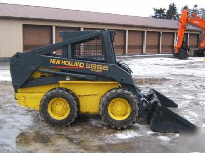 New holland LX865 farm tractor skid steer loader