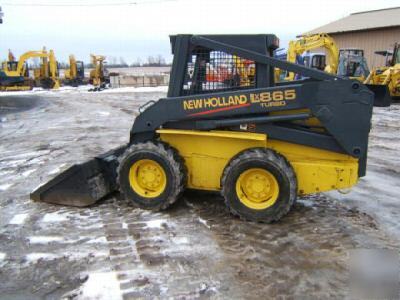 New holland LX865 farm tractor skid steer loader