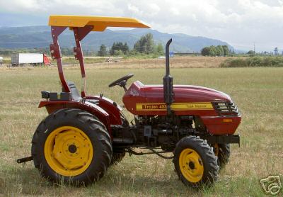 Taskmaster 32HP 4X4 compact tractor w/front end loader 