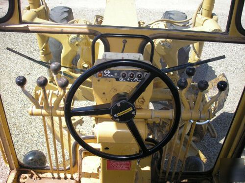 Cat 140G motor grader- still owned-used by county gov.