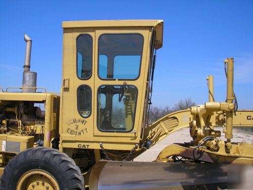 Cat 140G motor grader- still owned-used by county gov.