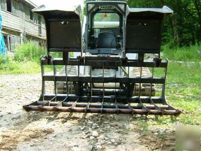 Skid steer root/demolition grapple