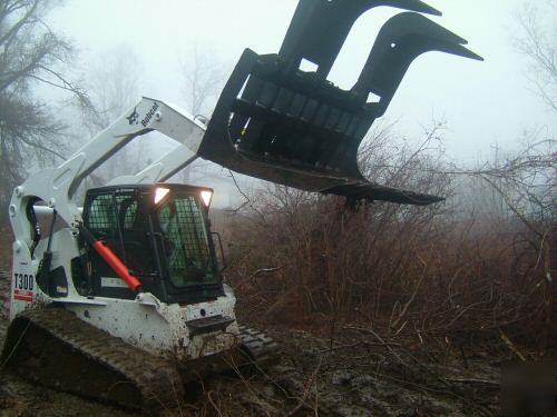 Skid steer root/demolition grapple