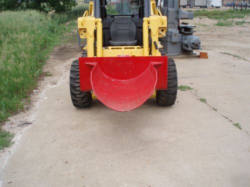 Skid steer tree spade with quick attach mount