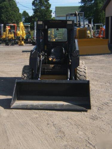 New holland LX665 farm tractor skid steer loader